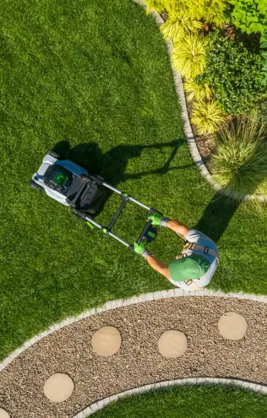 man mowing a lawn